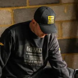 DeWALT DWC241-001 crni kačket – 100 godina Limited Edition, pamučni sa vezom